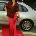 Wedding Limousine hire Perth with Lovely lady in red on red carpet